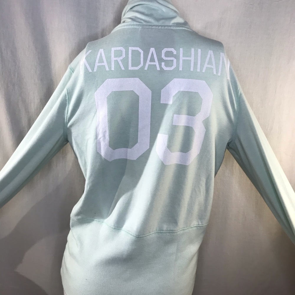 Kardashian Kollection sweater.